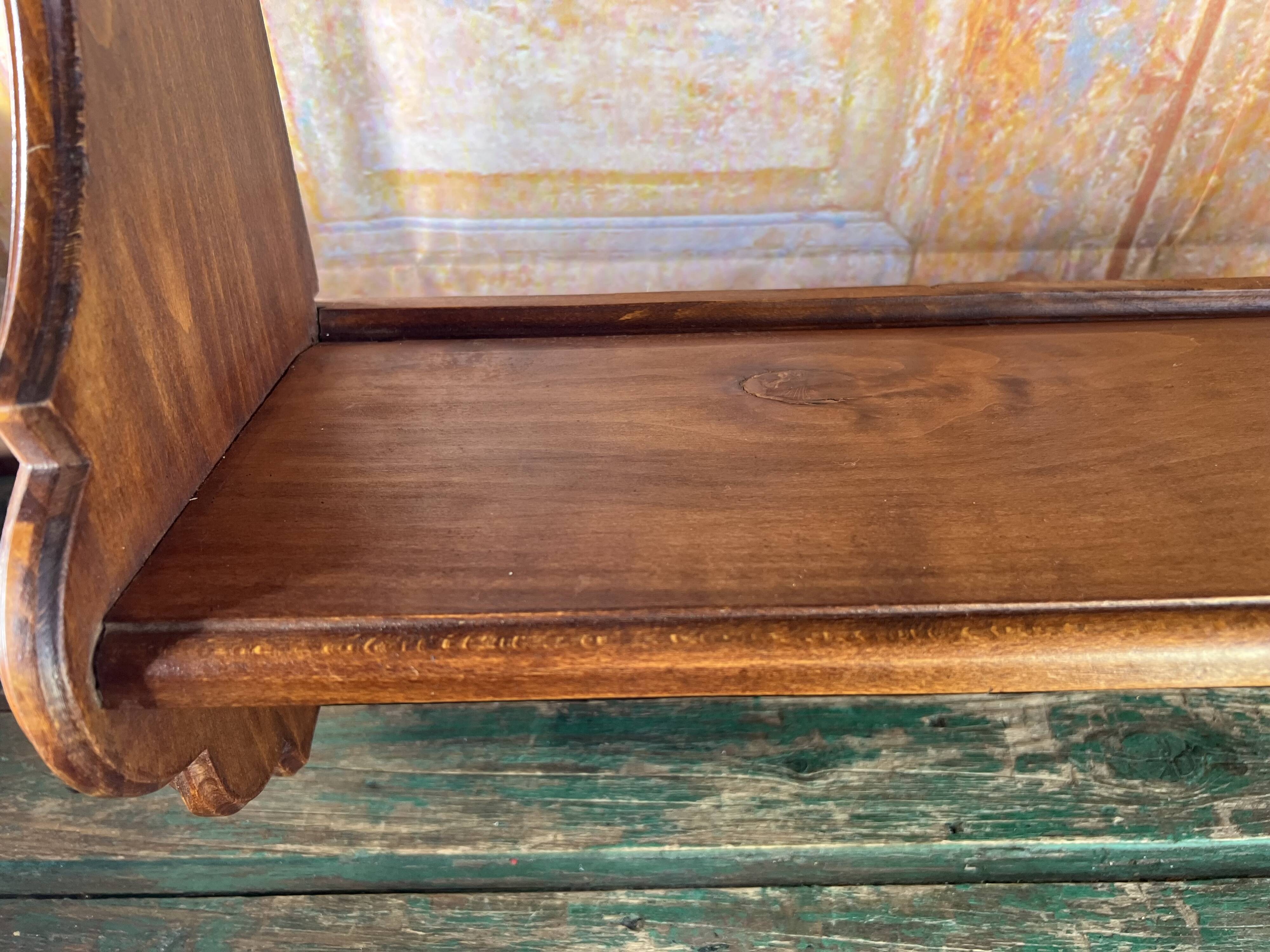 carved wooden wall shelf – Rustic and authentic feel