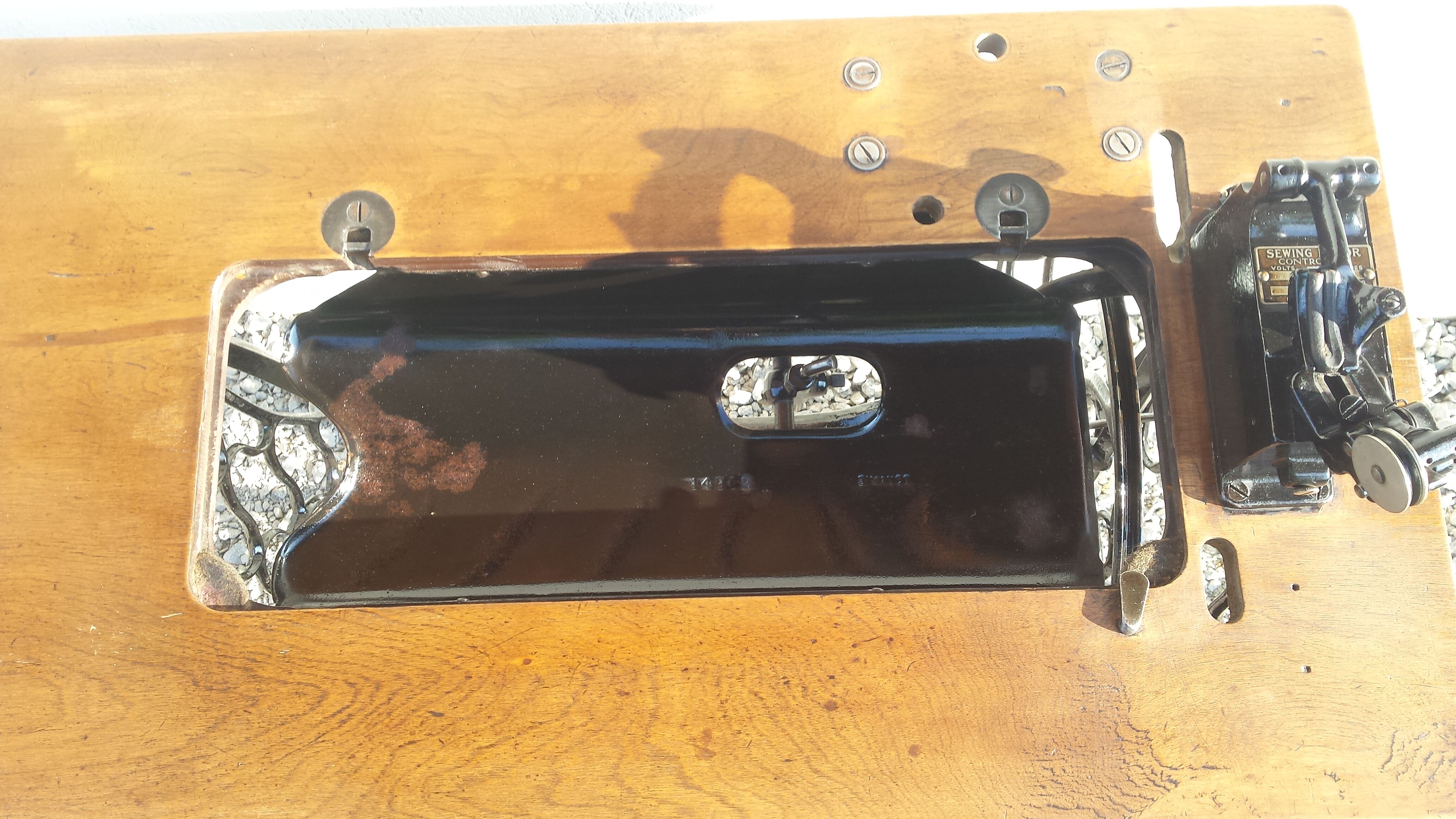 Singer's sewing machine foot console