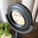 Wooden mirror on foot