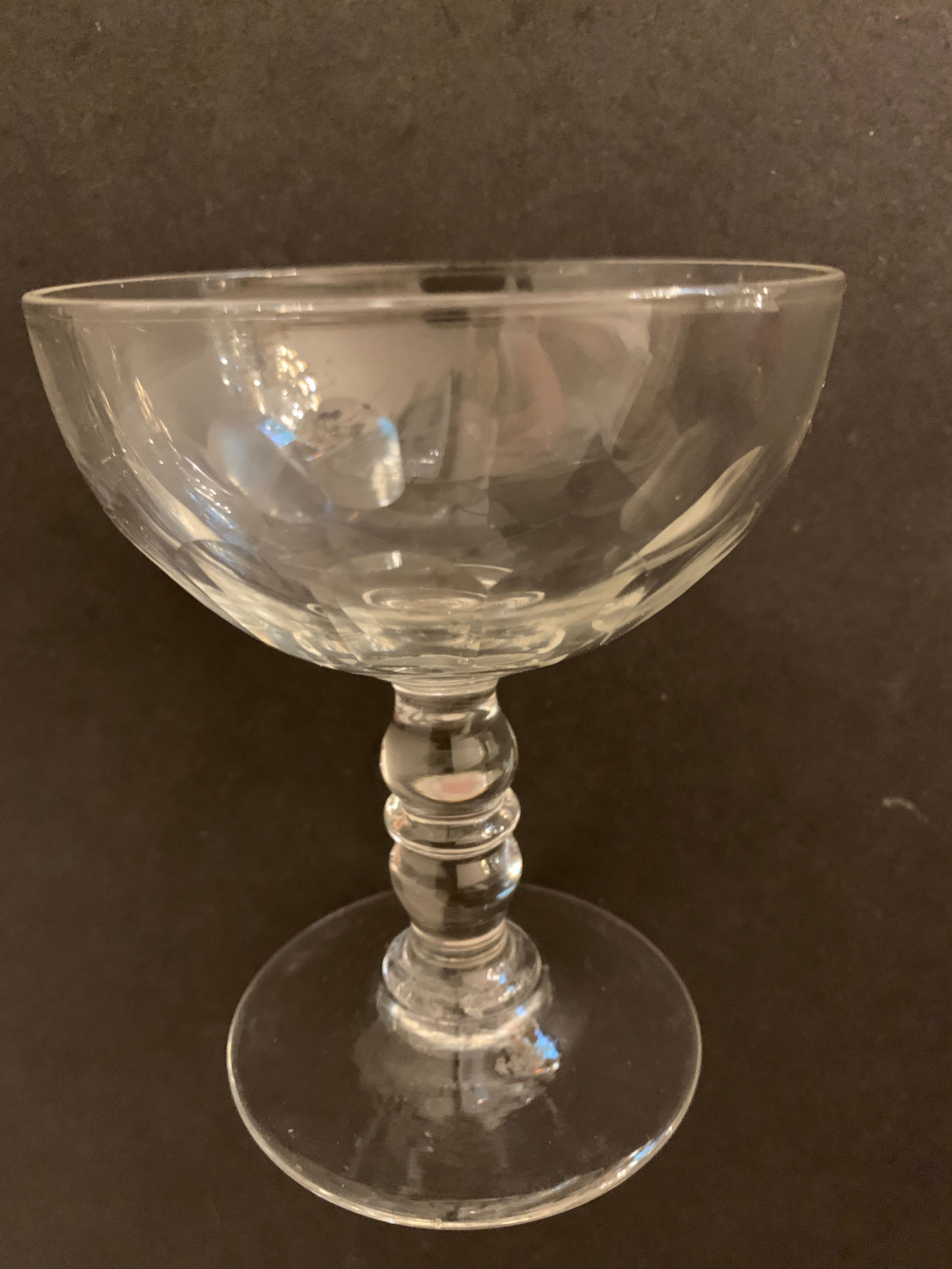 6 old champagne cups in faceted glass