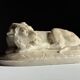 Marble sculpture of a reclining lion
