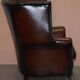 Victorian leather canapé and armchair, barrel back, circa 1860, restored.