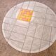Round ceramic and steel coffee table