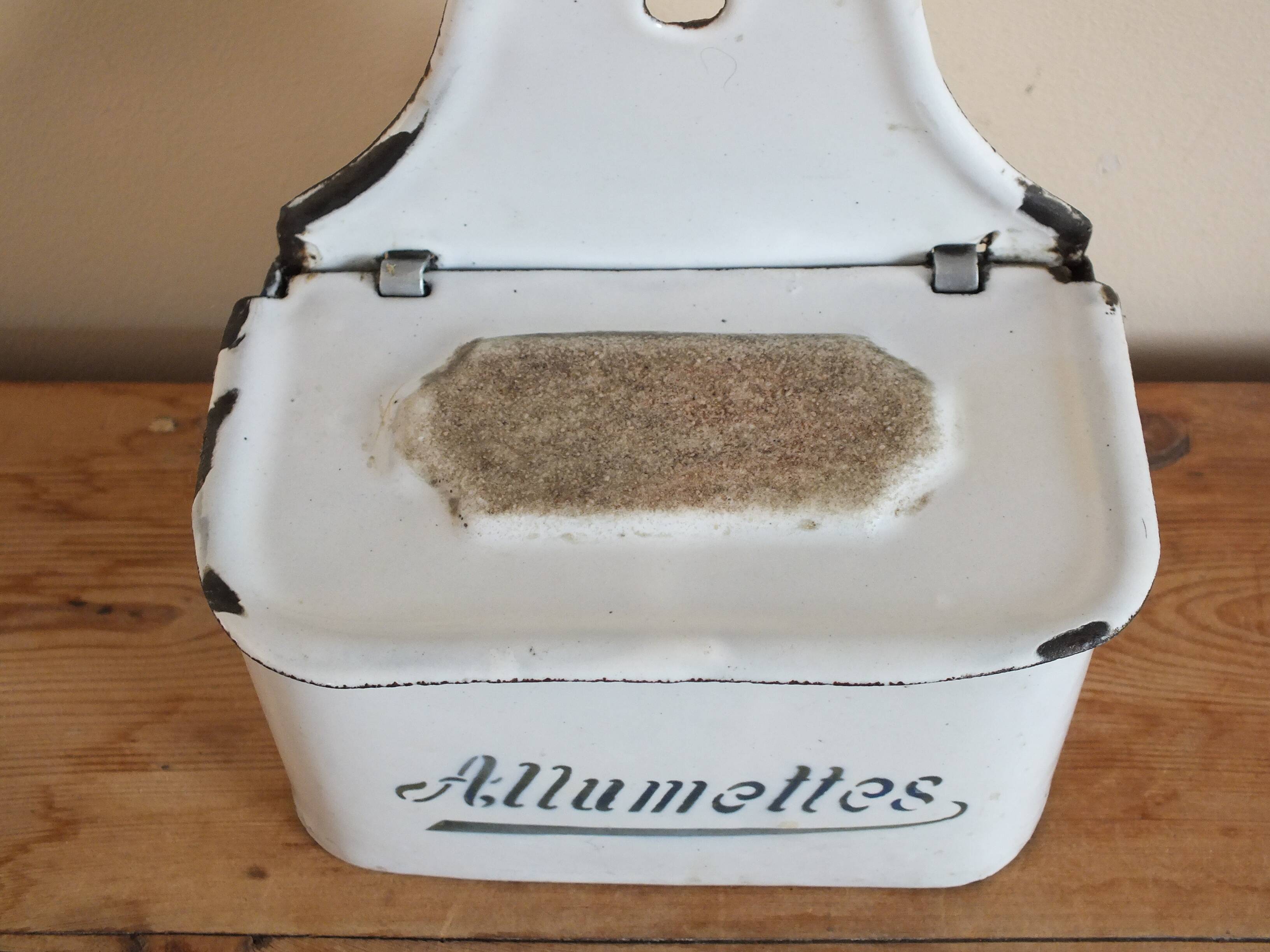 old matchbox in enameled sheet metal