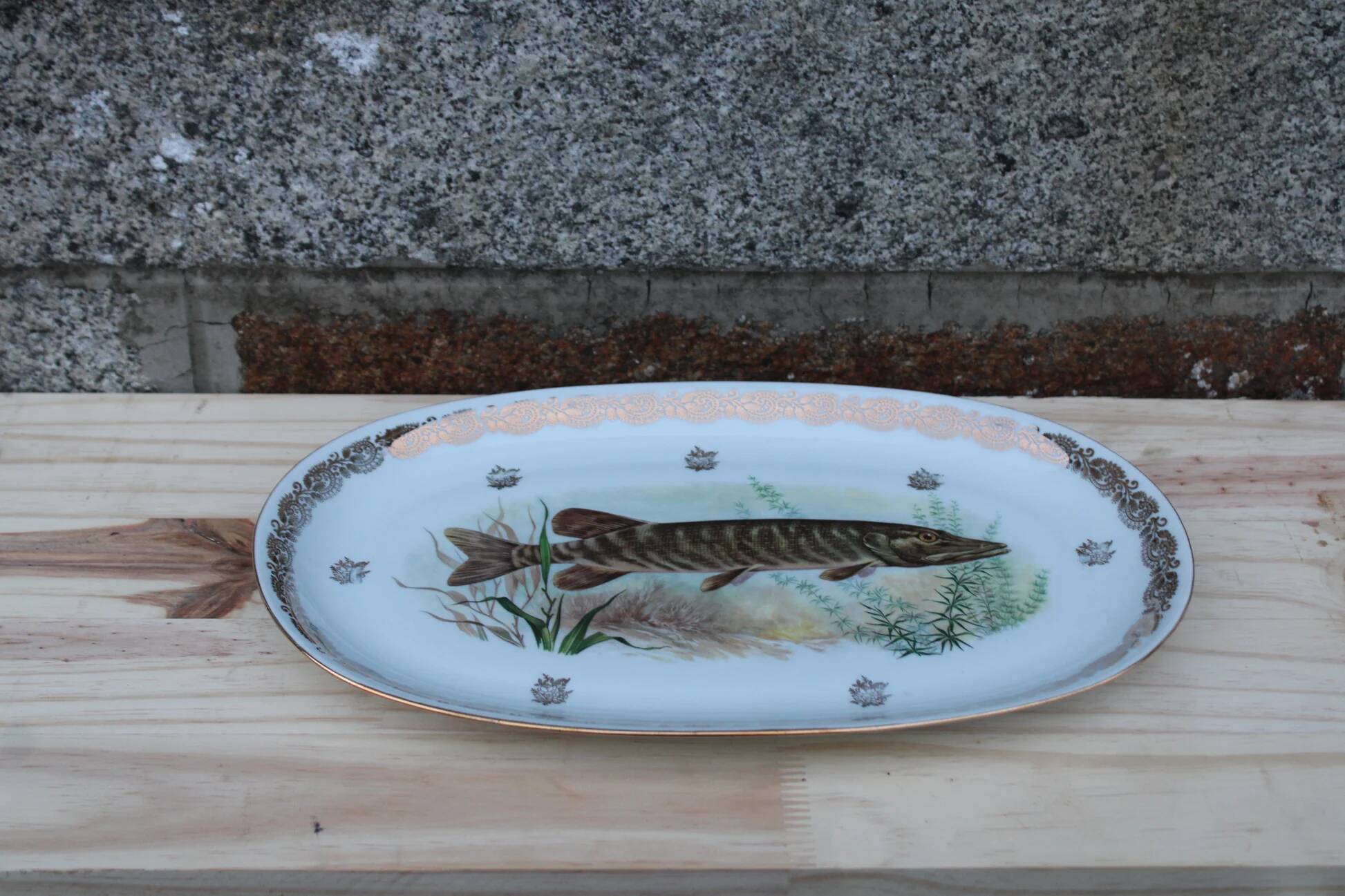 Large French porcelain dish L.C – Painted pike & gilded frieze