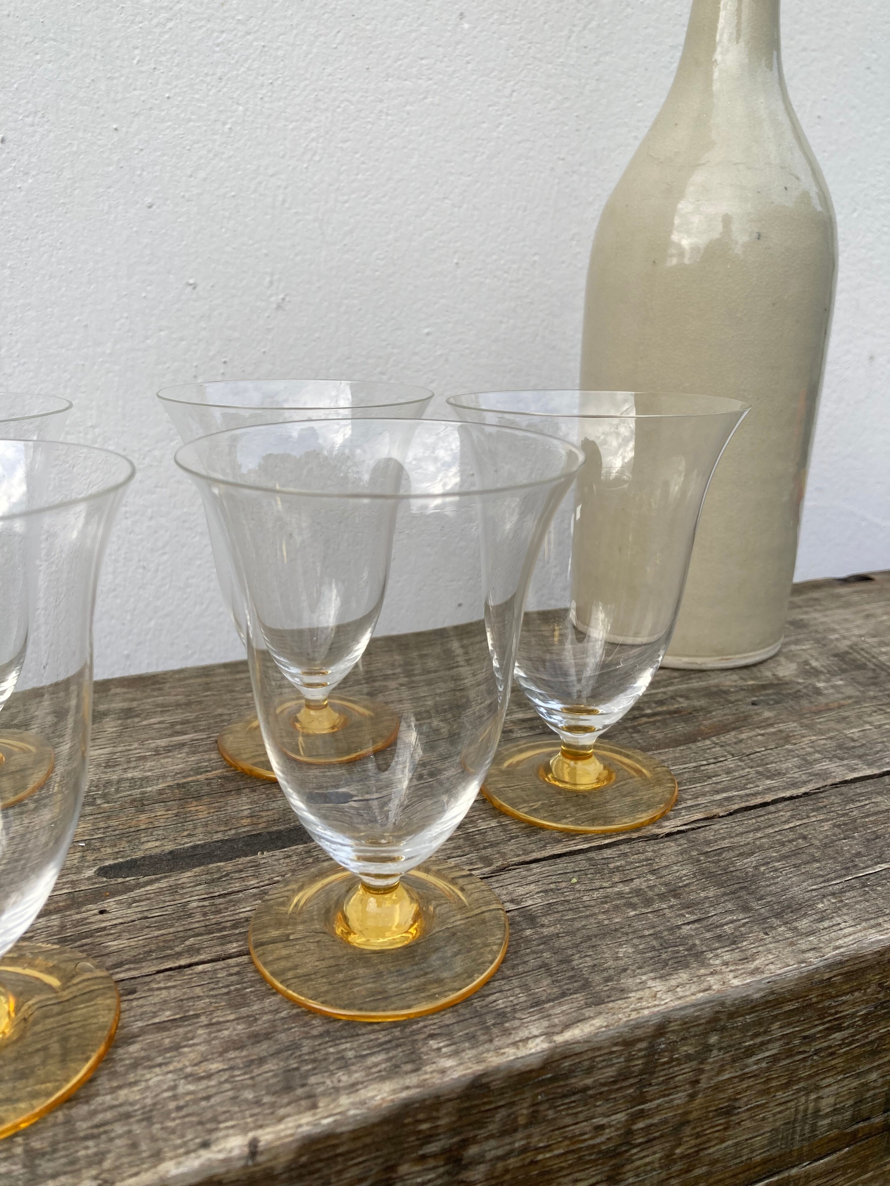 7 glasses with crystal stemmed yellow feet / cups