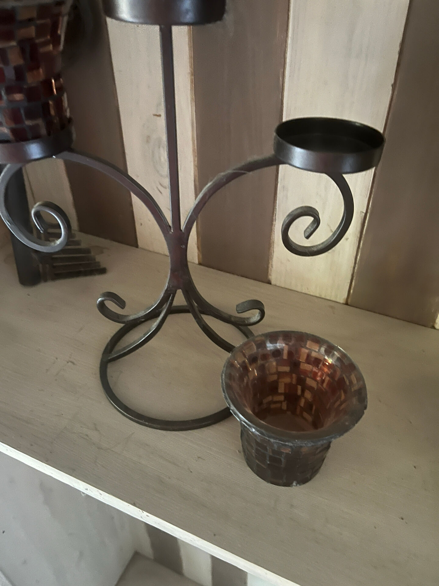 Three-branch candlestick in wrought iron and glass mosaic.