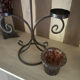 Three-branch candlestick in wrought iron and glass mosaic.