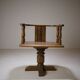 Swivel armchair in carved oak with ball bearings, early 20th century.