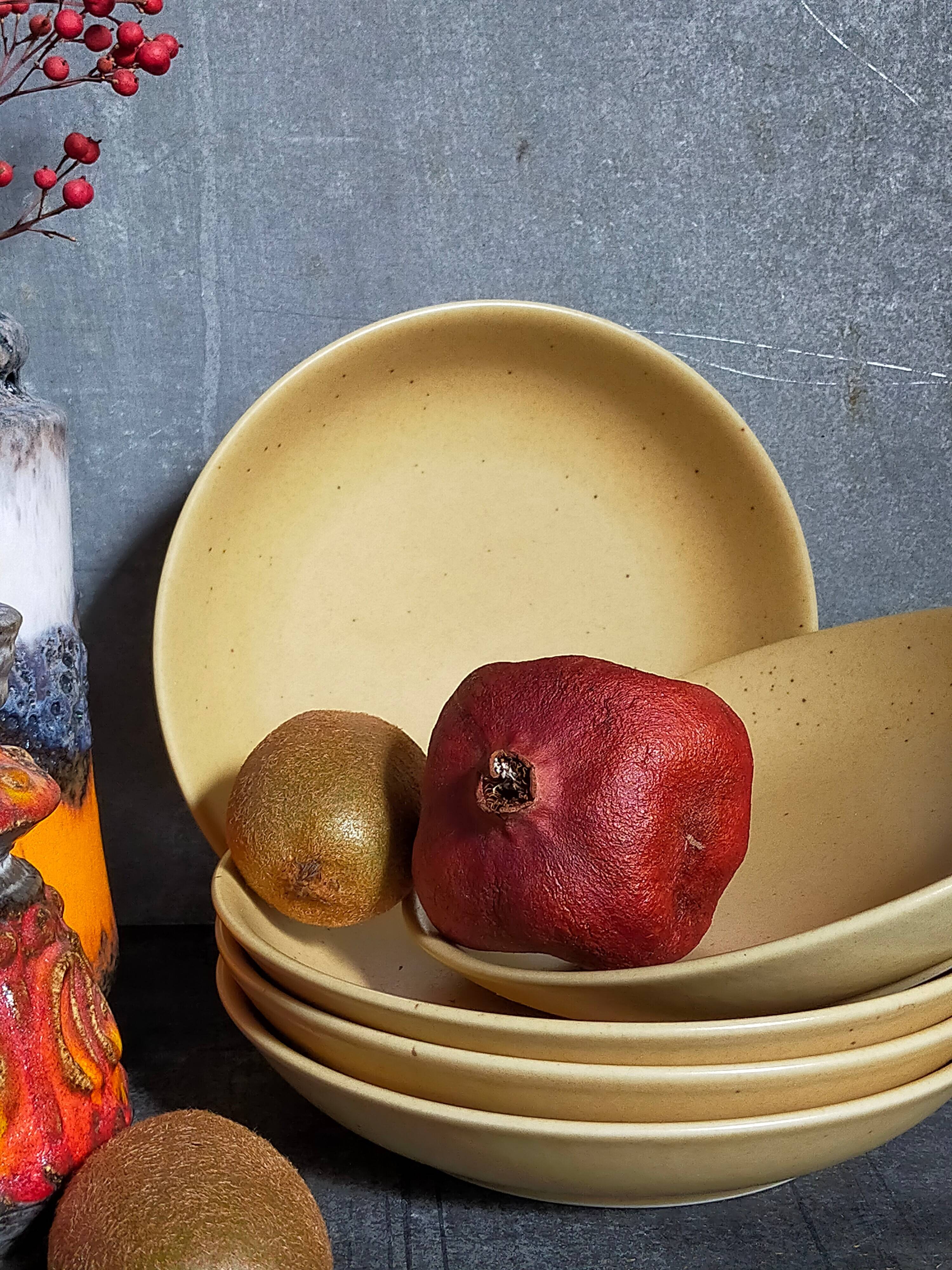 Five vintage natural stoneware soup plates