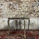 Game table in gray lacquered wood with white filling stamped gouffé