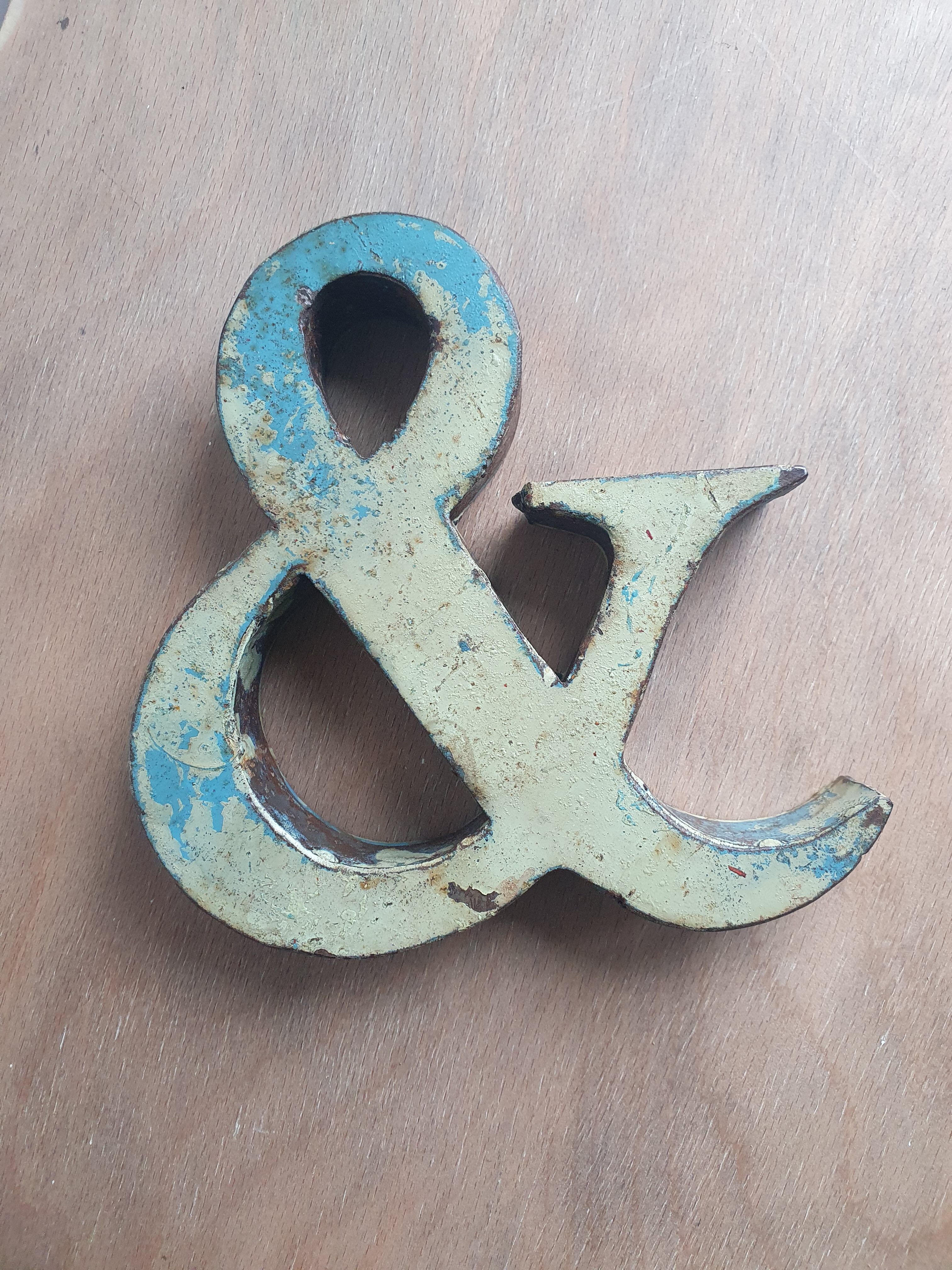Ancient iron letter