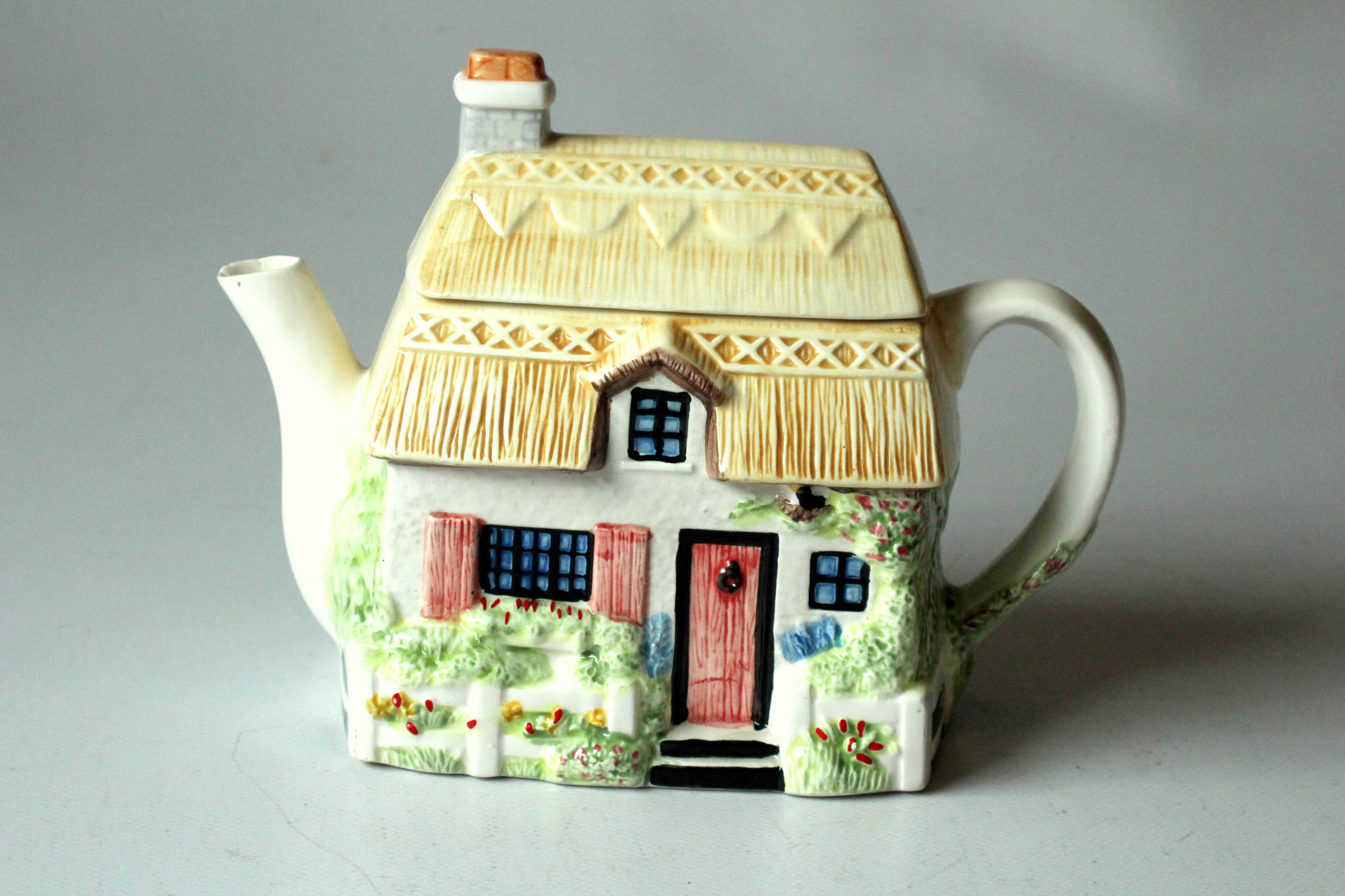 Handpainted fine ceramic design teapot "The Village"