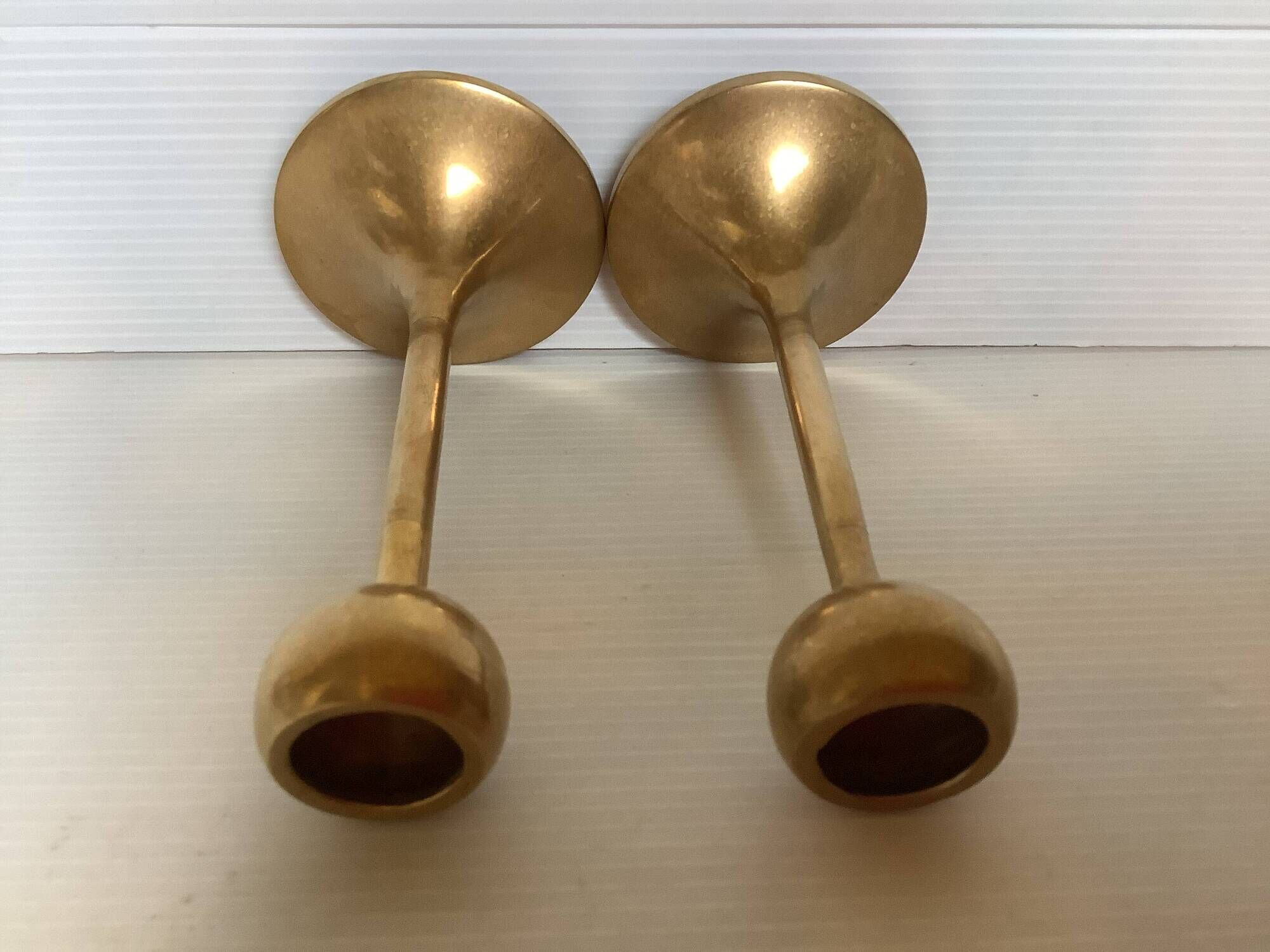 Pair of Scandinavian brass tulip foot candlesticks