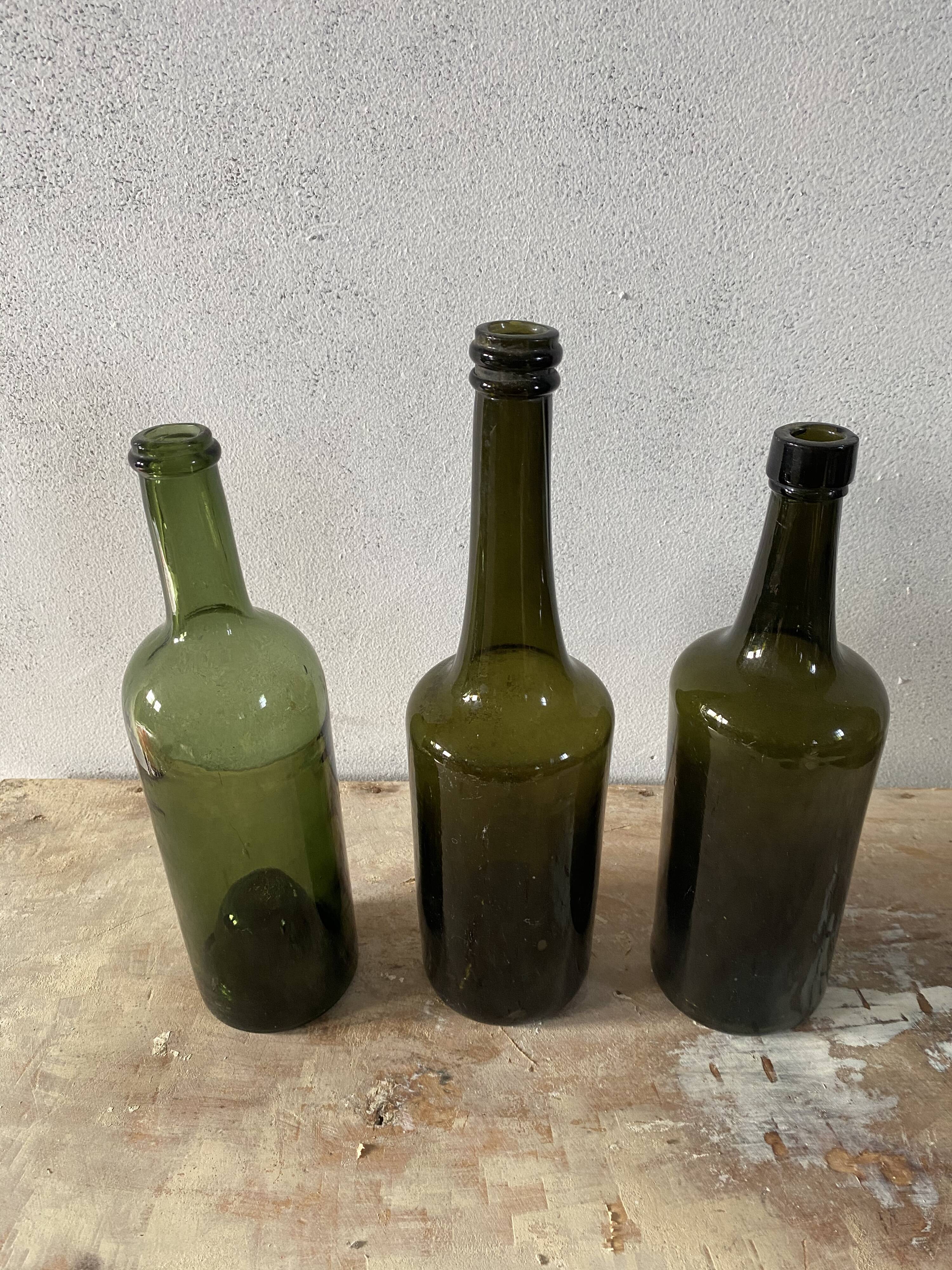 Set of 3 old blown glass bottles