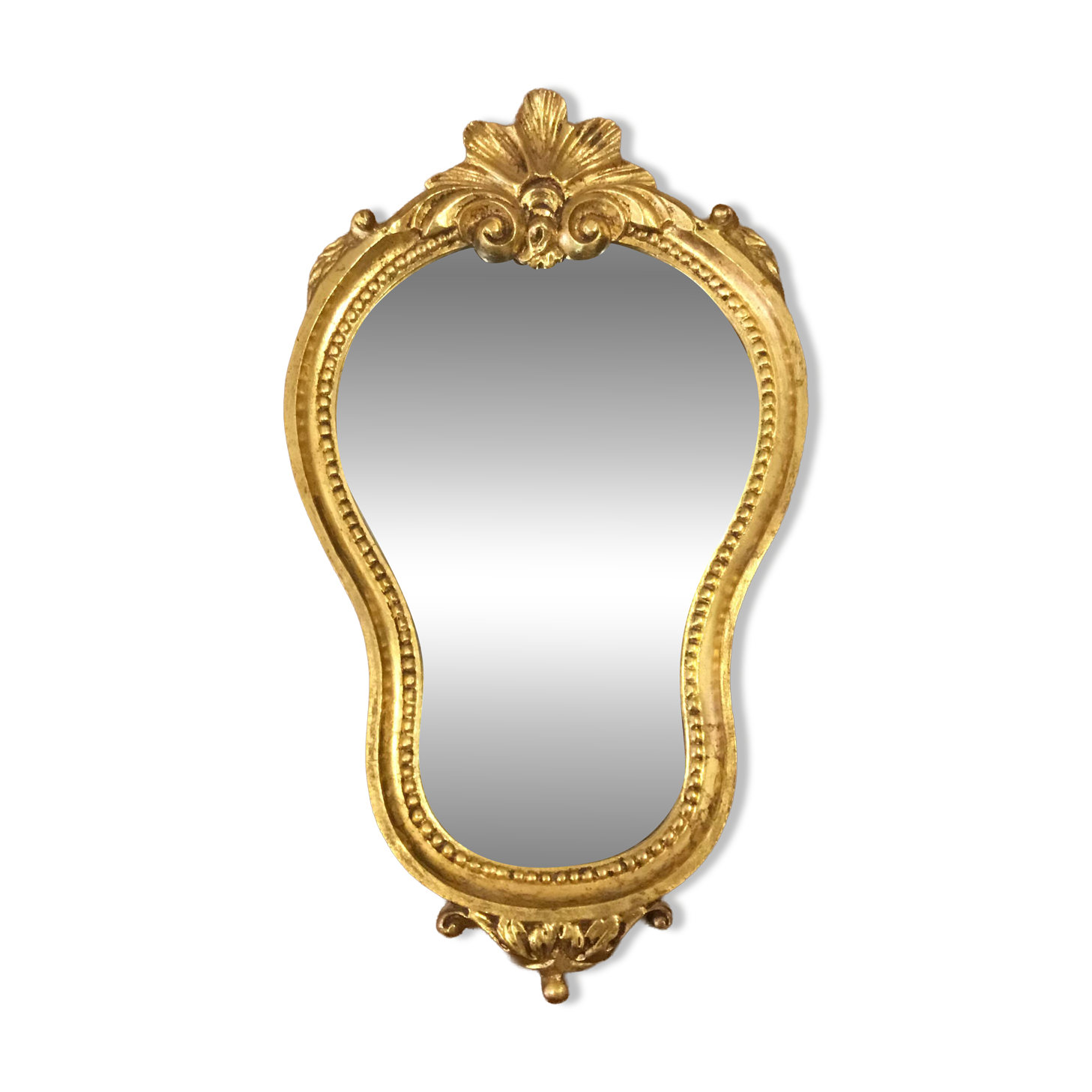 Golden wooden mirror in baroque style