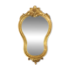 Golden wooden mirror in baroque style