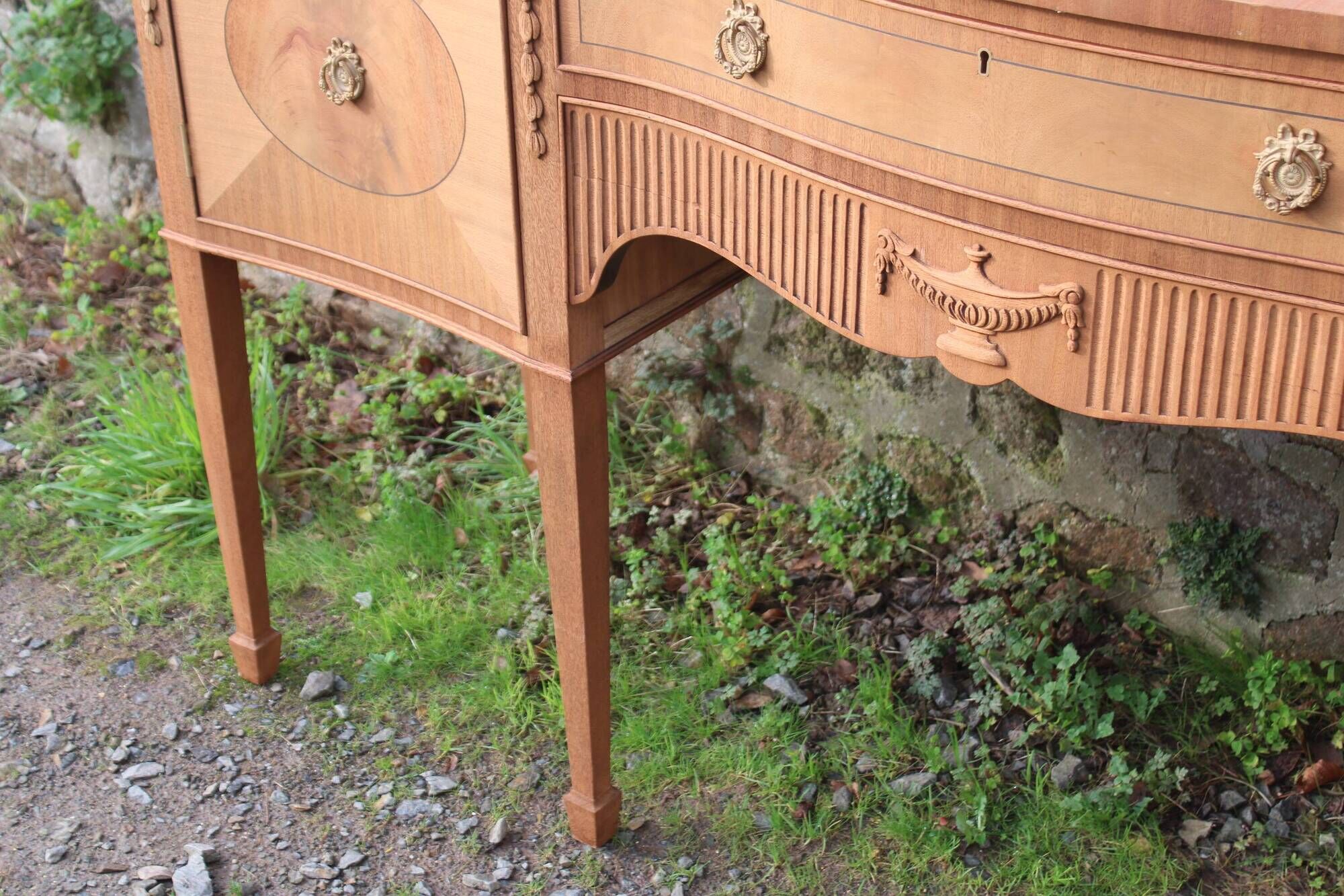 English-made enfilade in Louis XVI style with light wood veneers.