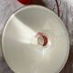 Vintage red enameled sheet metal pendants