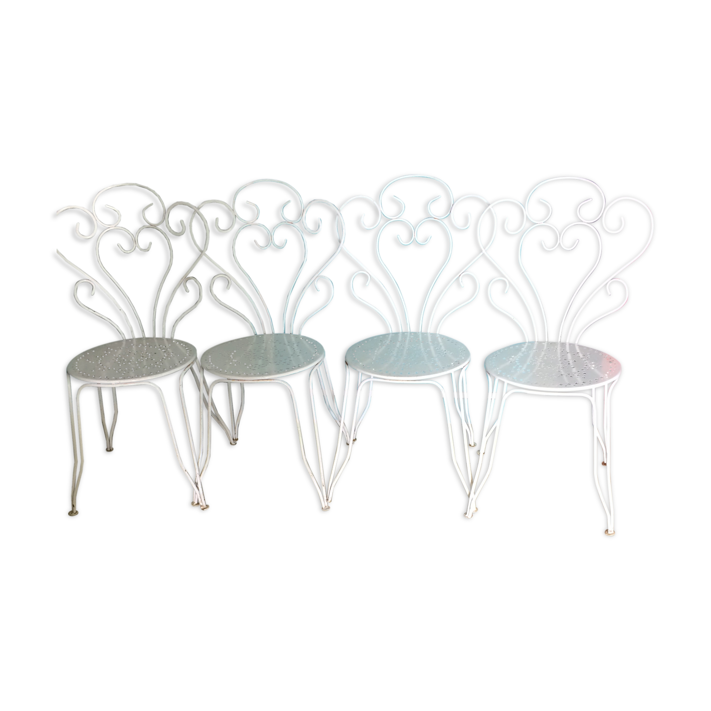 Lot of 4 wrought iron garden chairs