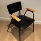 Paire de fauteuils laqués noirs modèle "M" de Pierre Guariche, vers 1950