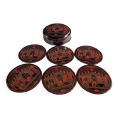 Set of 6 black lacquer coasters, 1970s.