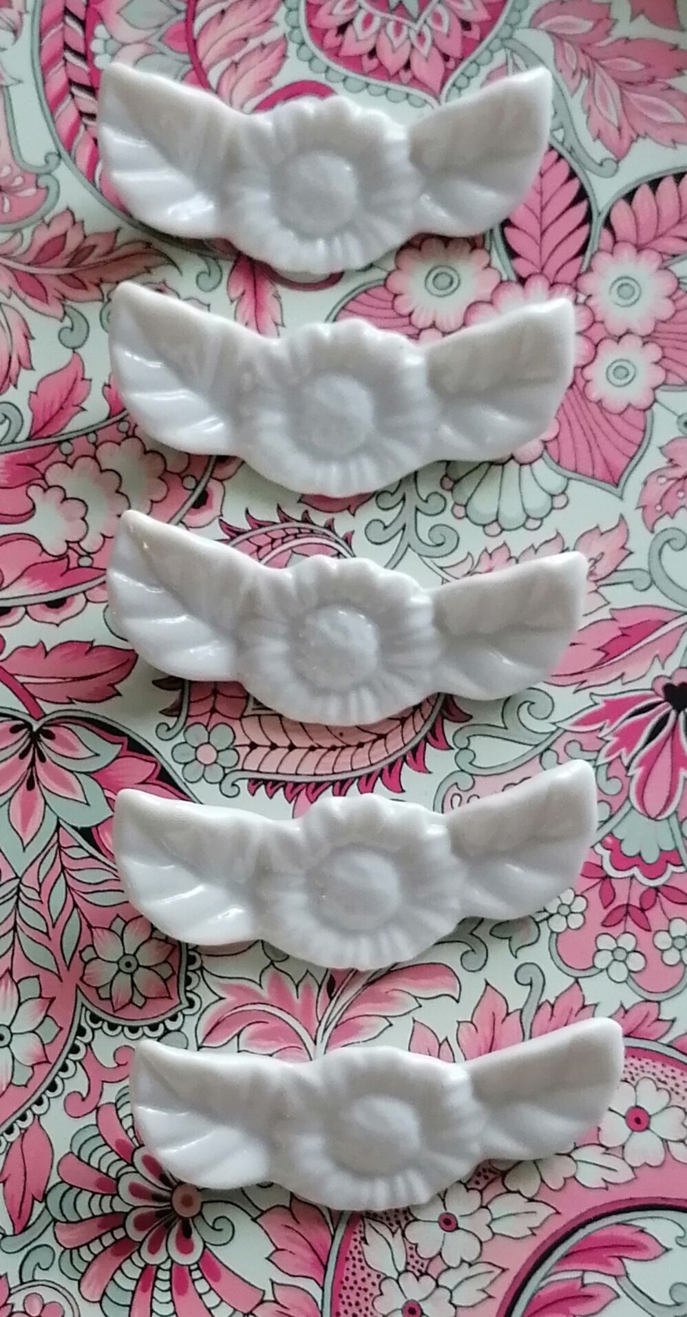 6 porte couteaux en porcelaine blanche