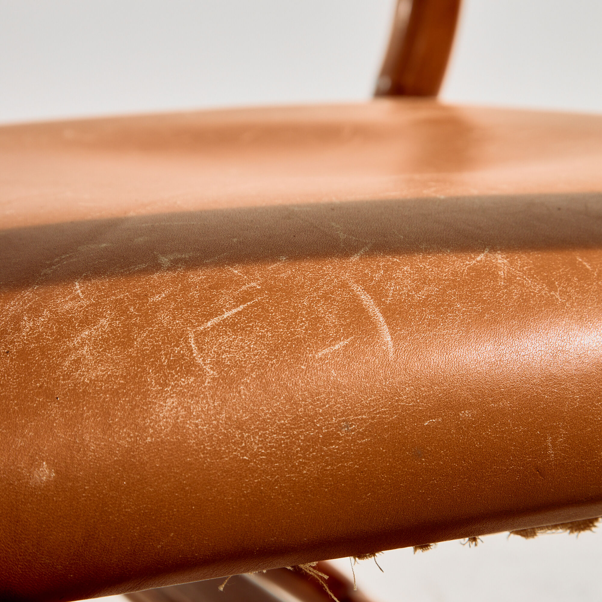 Walnut armchair with bamboo design