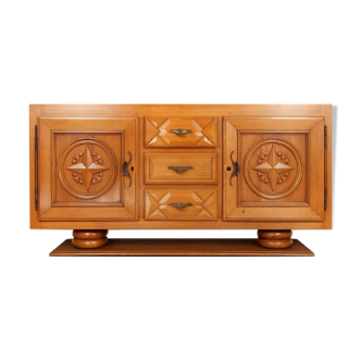 Sideboard in a row from the Art Deco period in light wood.