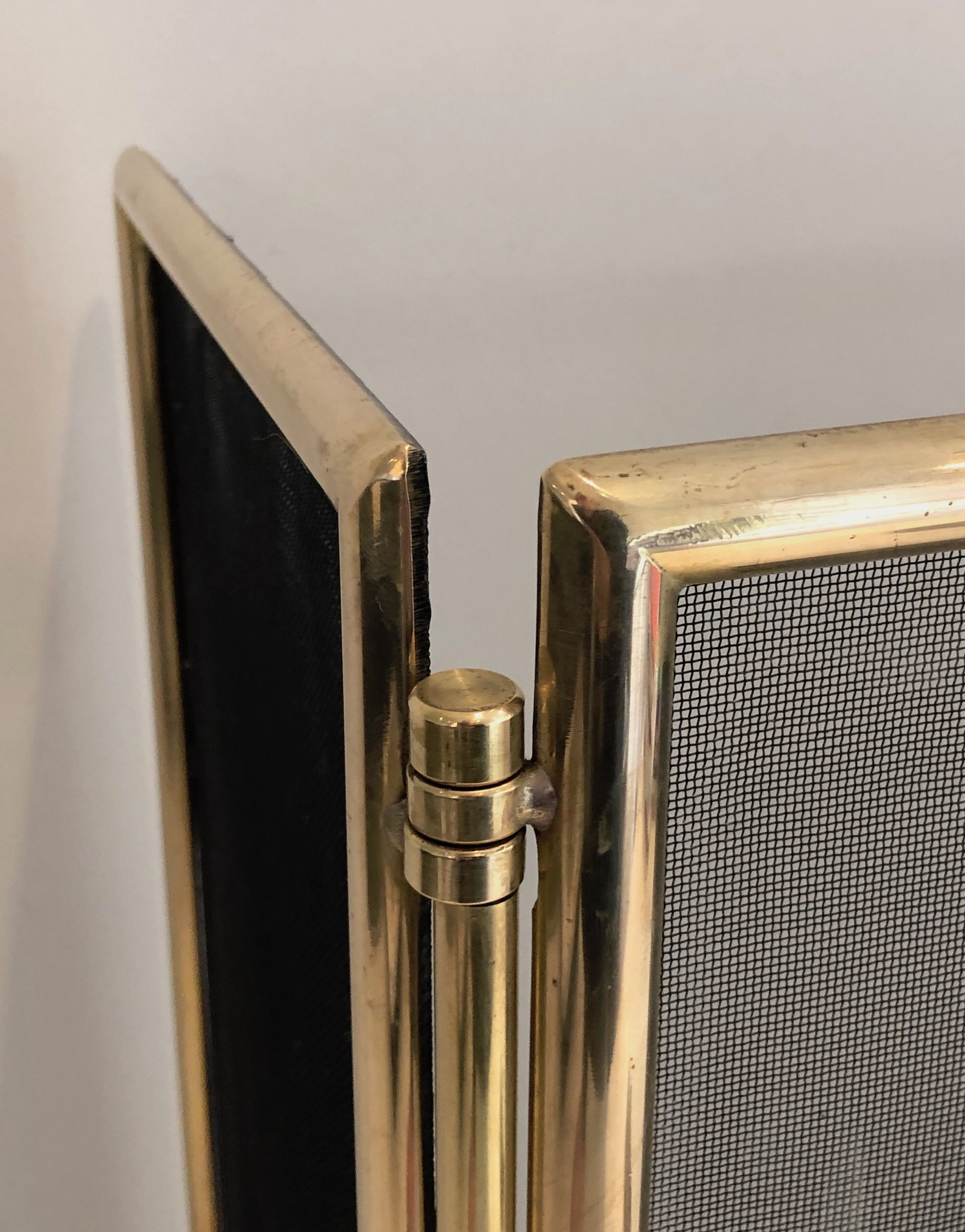 Brass and wire mesh firewall. french work. around 1970