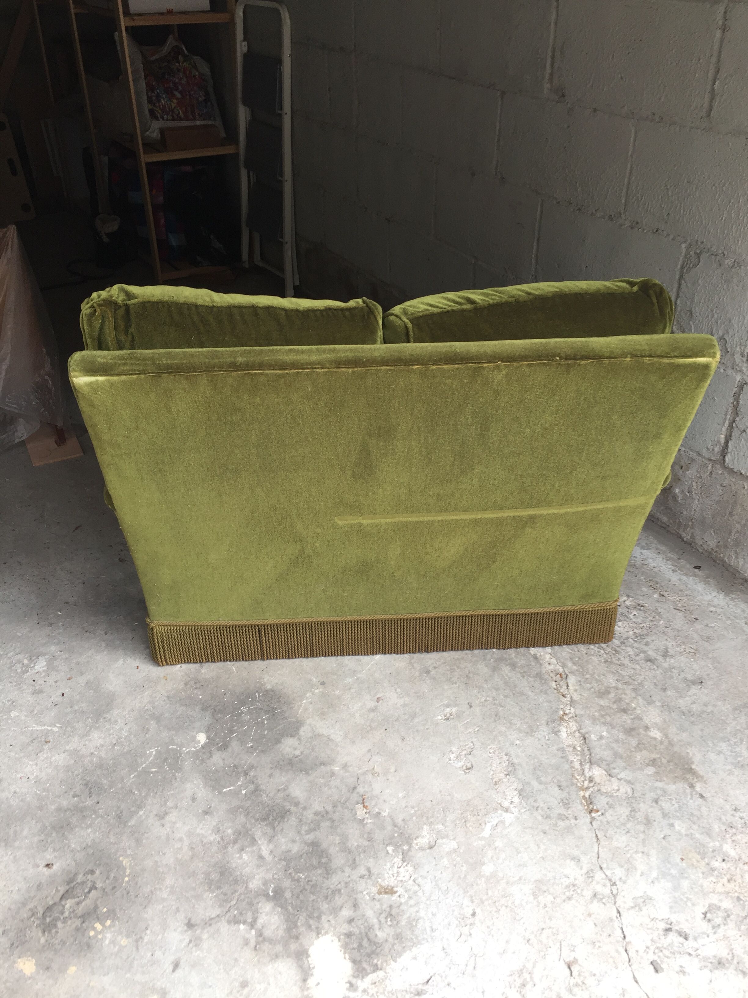 Vintage green velvet sofa