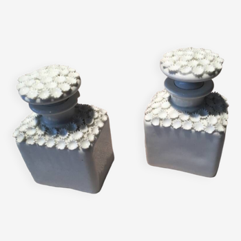 Set of 2 white porcelain bottles with very small white flowers