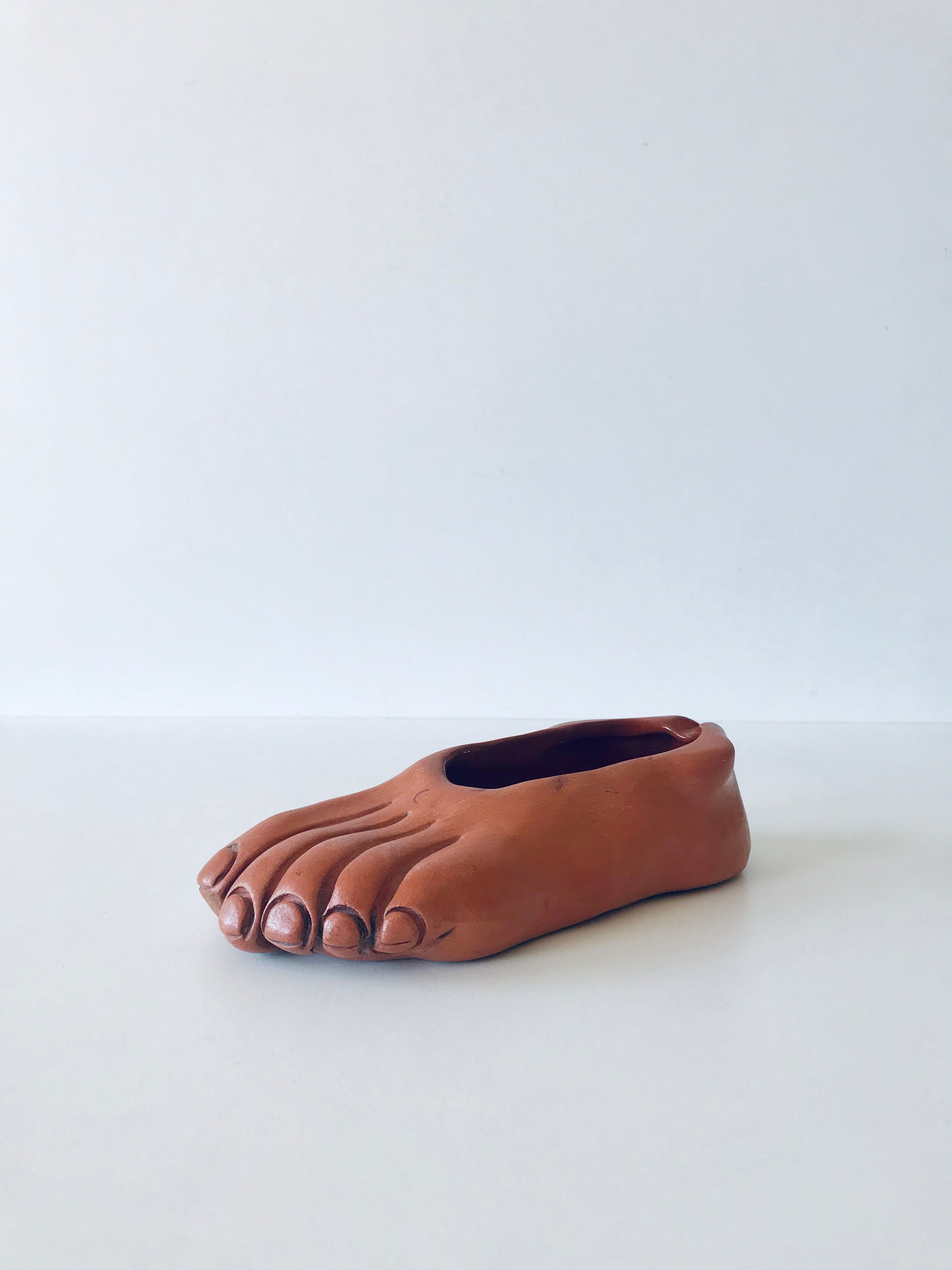 Foot ashtray signed Jean Marais