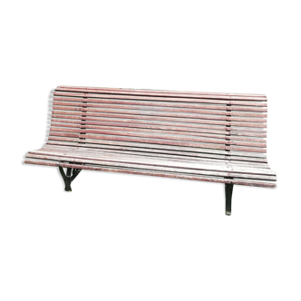 Old wooden bench and wrought iron