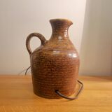 Accolay table lamp in the shape of a jug.