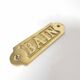 Brass bathroom door plate