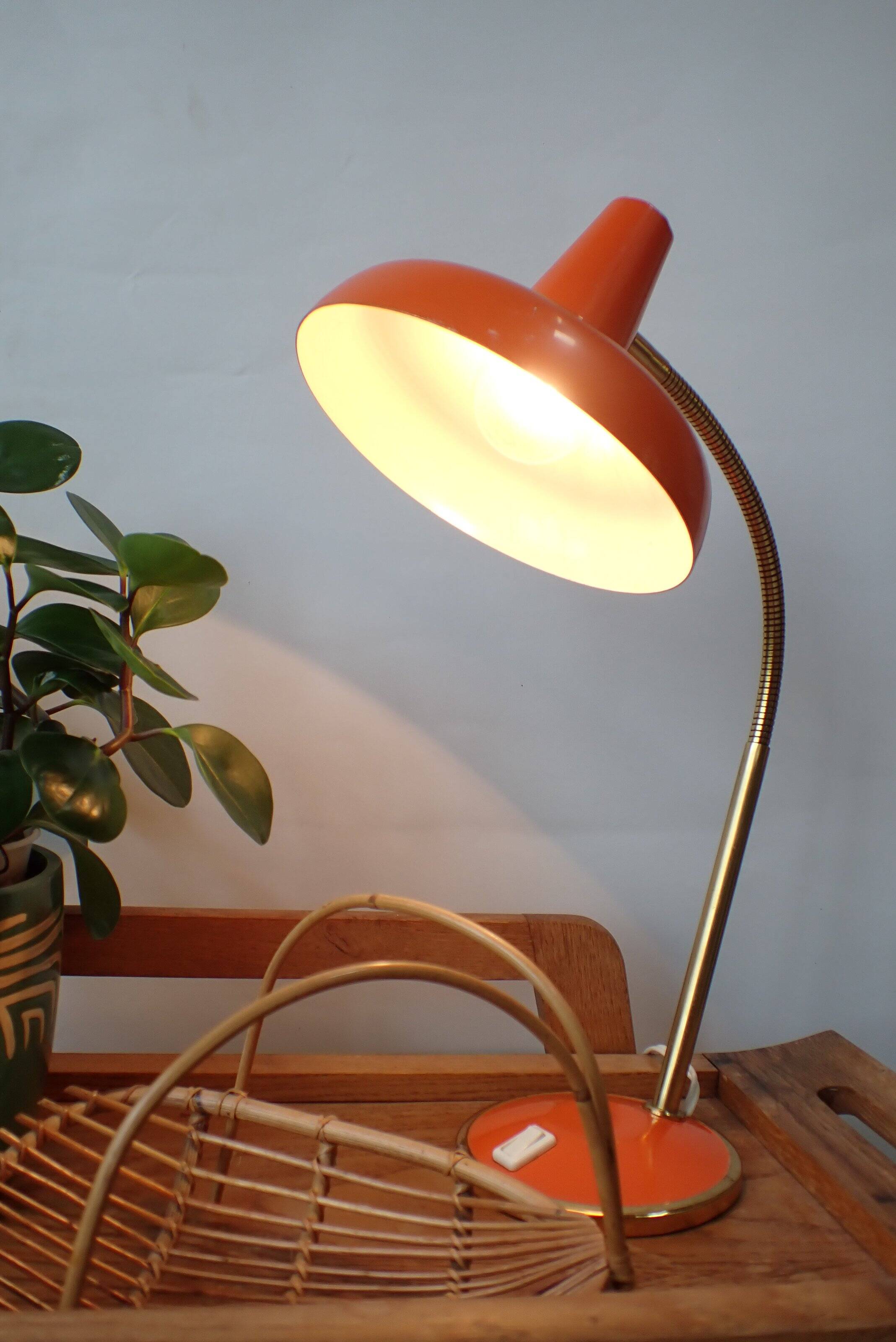 Vintage adjustable lamp, orange, made of metal.