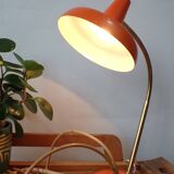 Vintage adjustable lamp, orange, made of metal.
