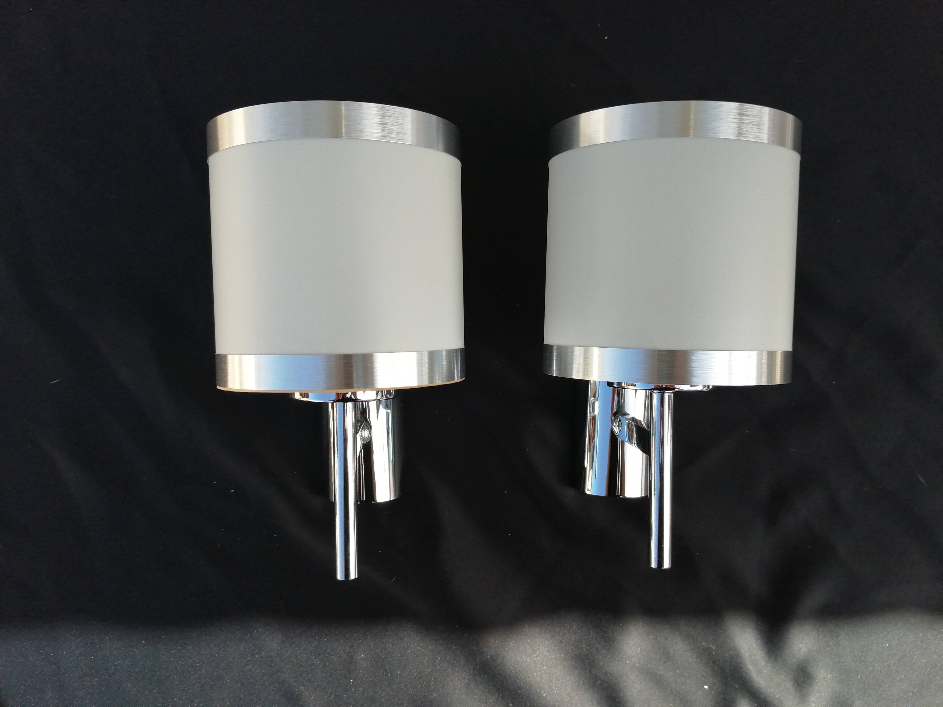 Pair of chrome design wall lights and vintage white hat 1970