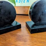 Duo of art deco bookends in black marble and onyx