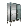 Wrought-iron display case with coil decorations