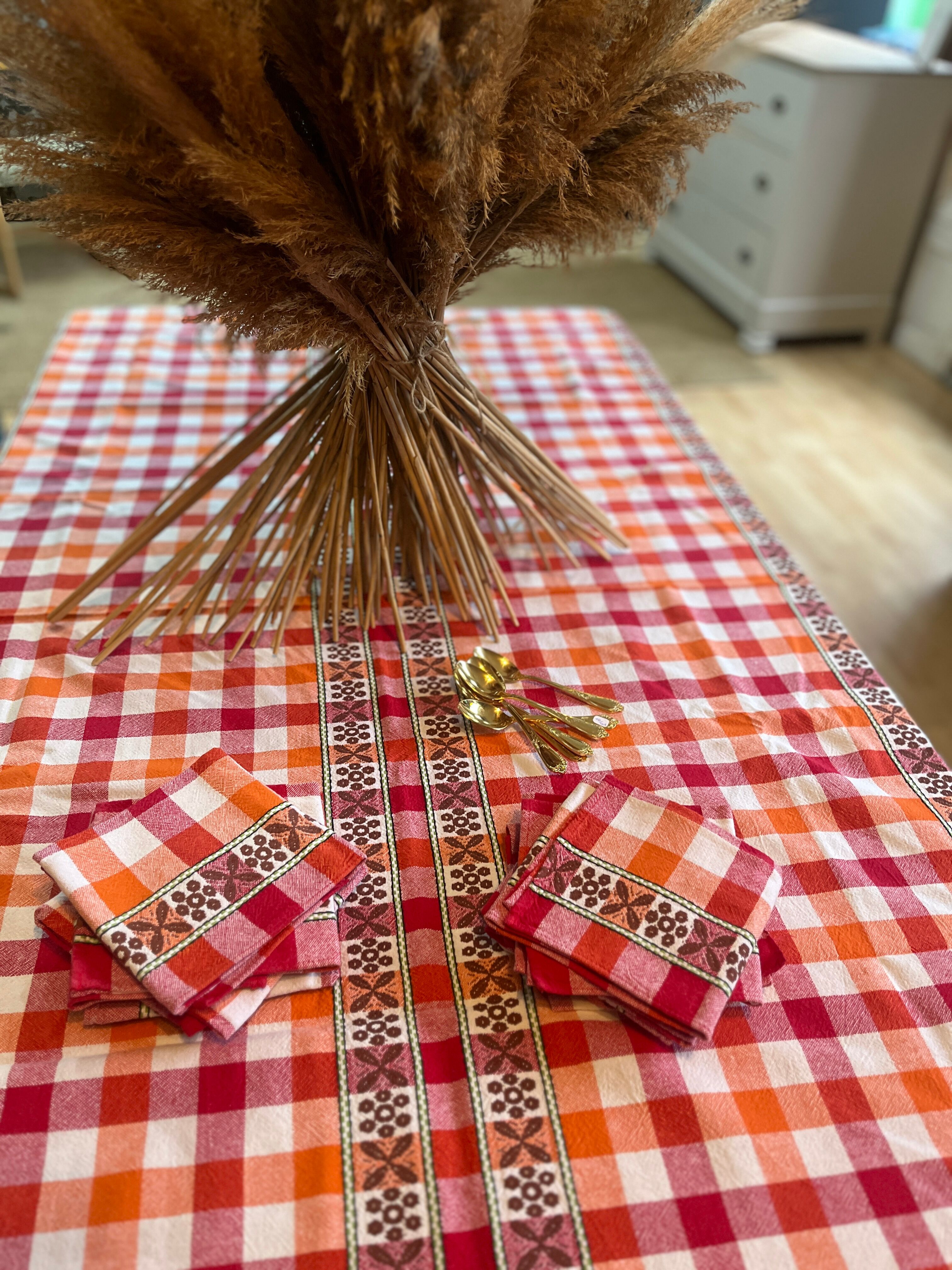 Checkered tablecloth and matching towels