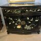 Chinese buffet with 2 doors and 2 drawers in black lacquer.