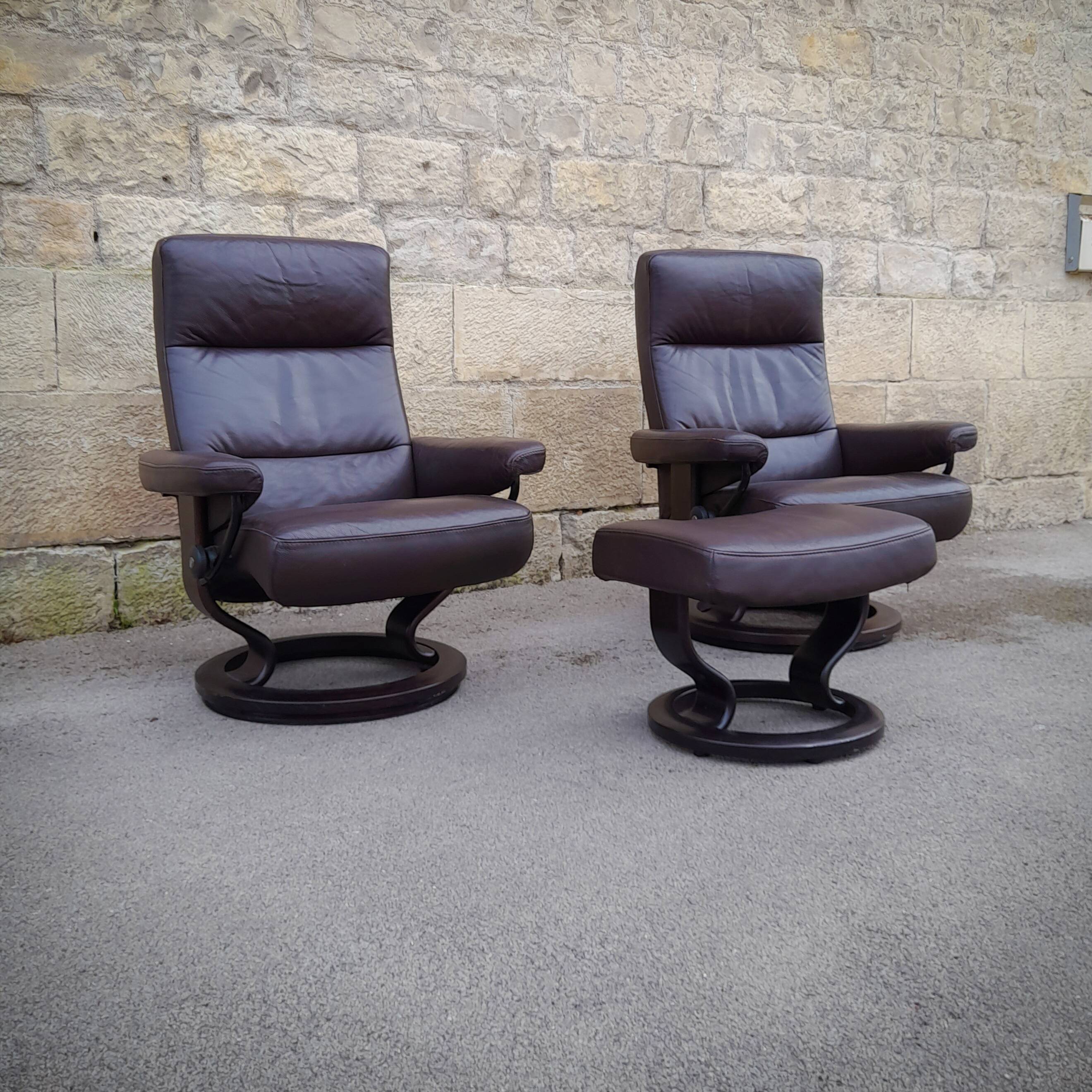 Pair of Scandinavian leather armchairs and ottoman, Ekornes, Norway, 1970s