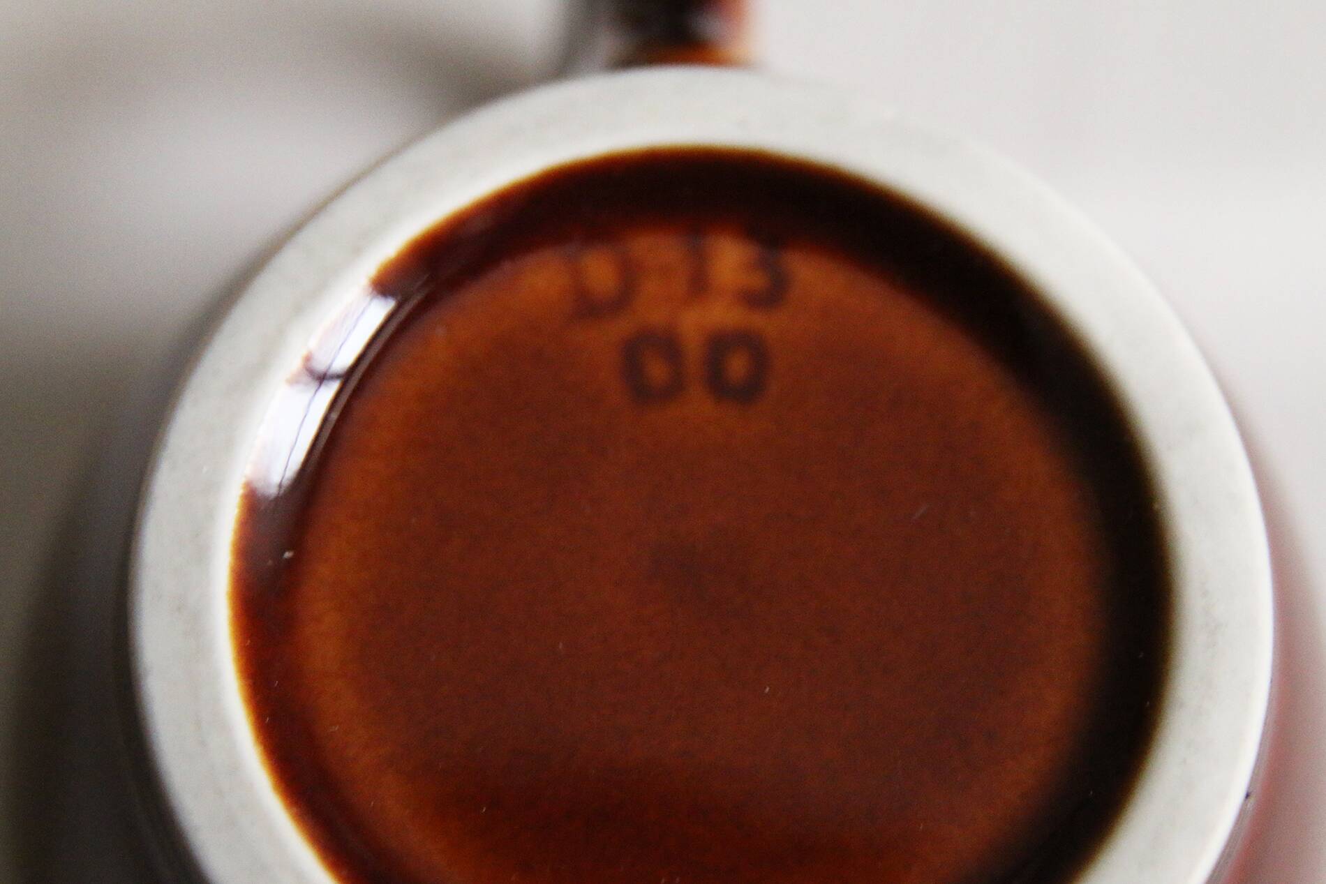 2 brown glazed ceramic teapots