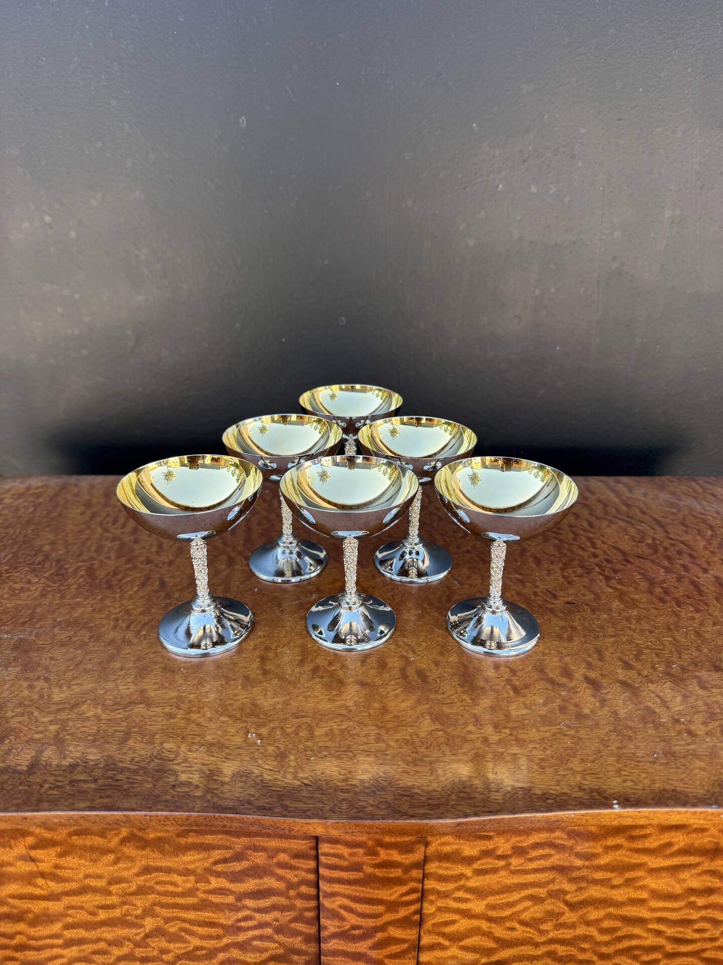 Silver-plated metal wine glasses on stems from the 1970s.