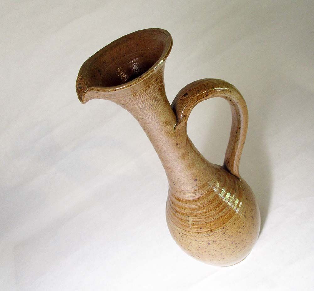 Elongated sandstone vase