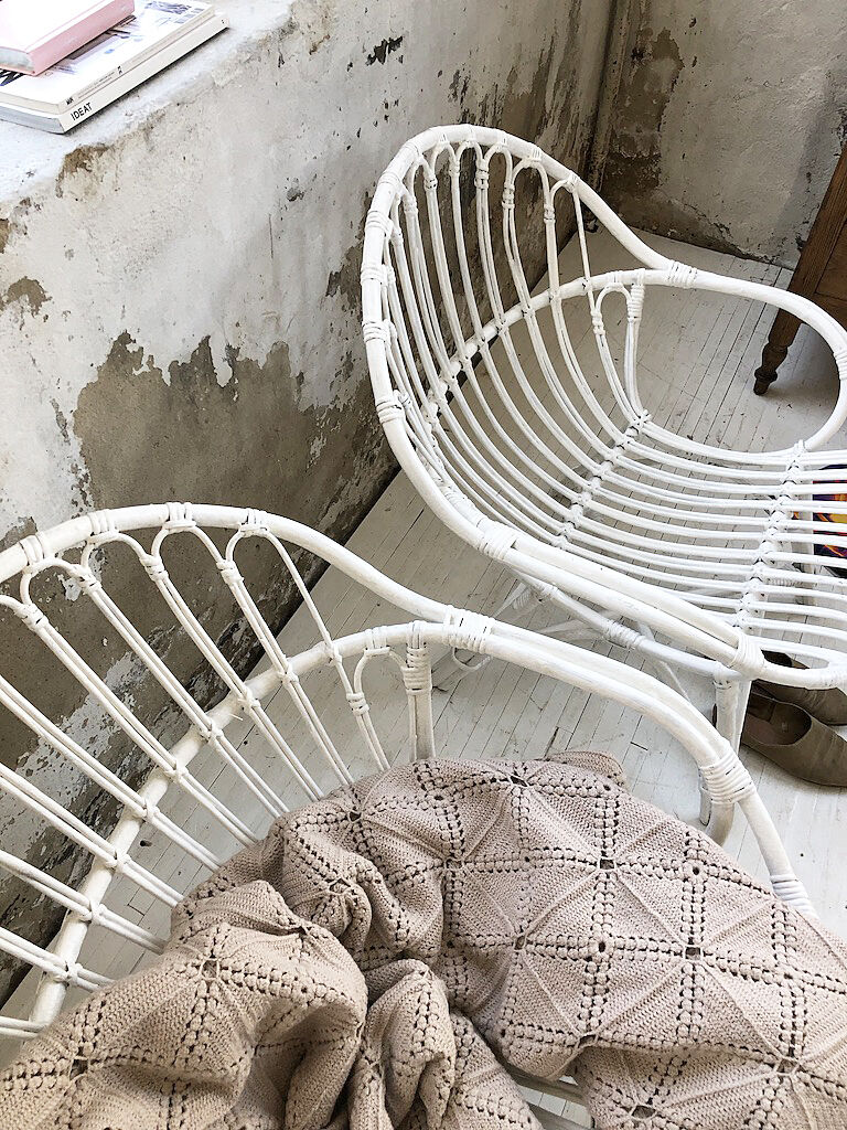 Pair of white rotin armchairs