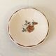 Vintage shallow dish Digoin Sarreguemines with a burgundy rose design.