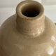 Beige stoneware bottle vase